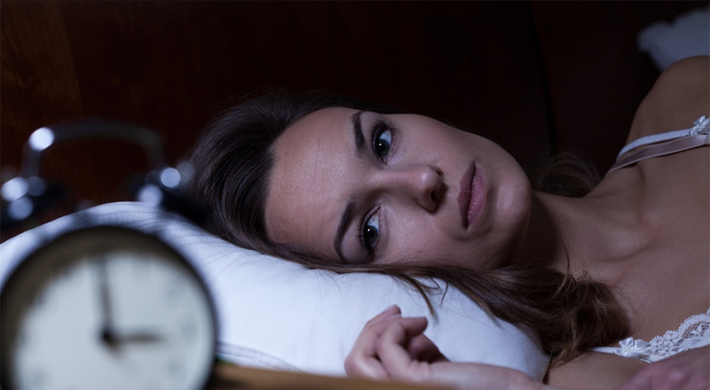 Cannabis and Insomnia clinical study represented by a woman suffering from Insomnia.